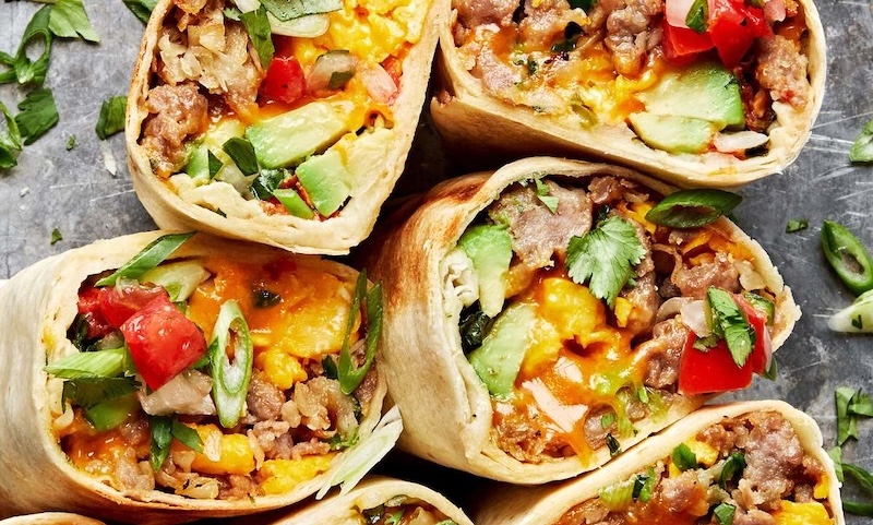 A breakfast burrito on a table in Athens, GA
